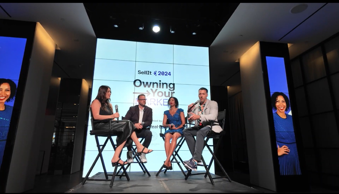 Justin Konikow speaking on a panel at the Sell It Owning Your Market event